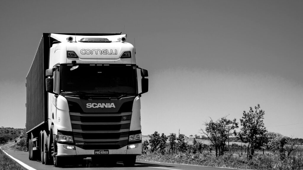 White truck on road during daytime.