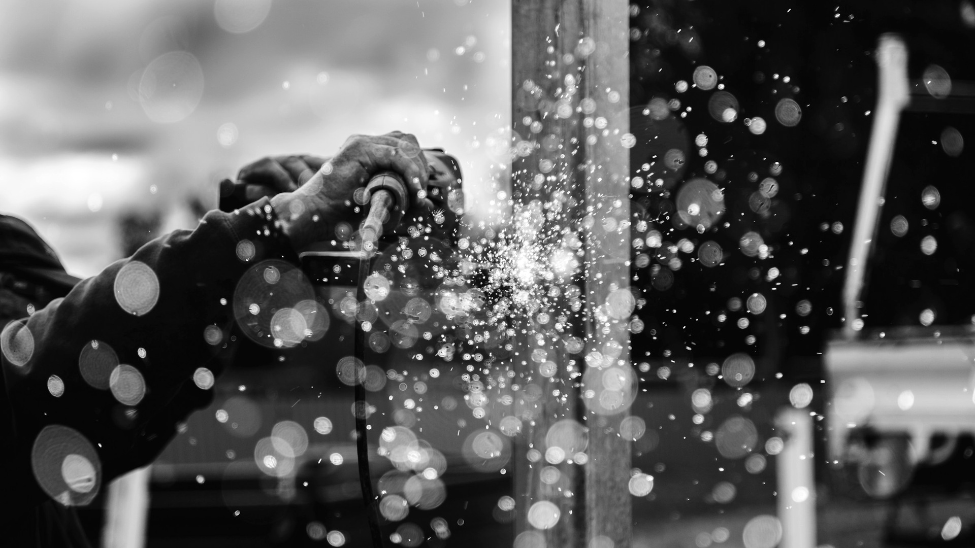 Person holding tool during daytime.