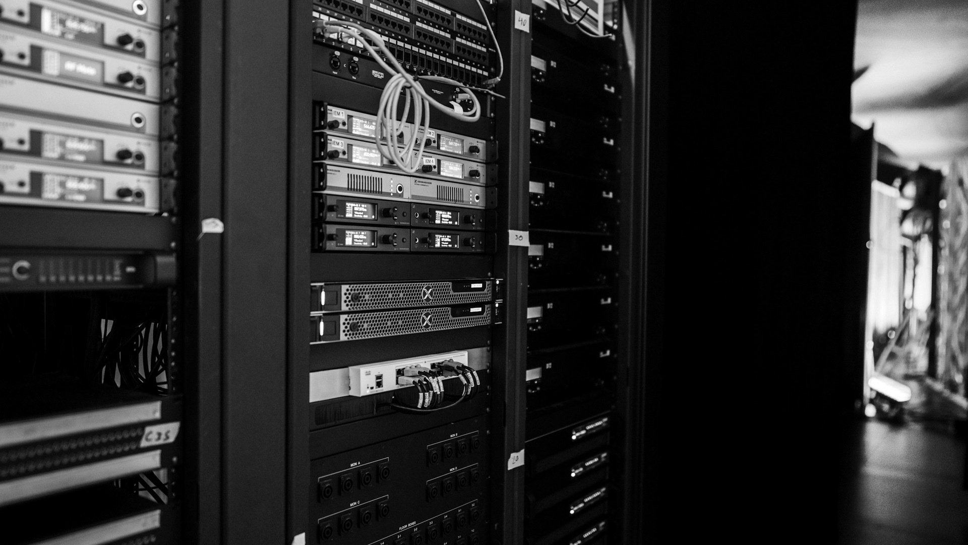 A rack of servers in a server room.