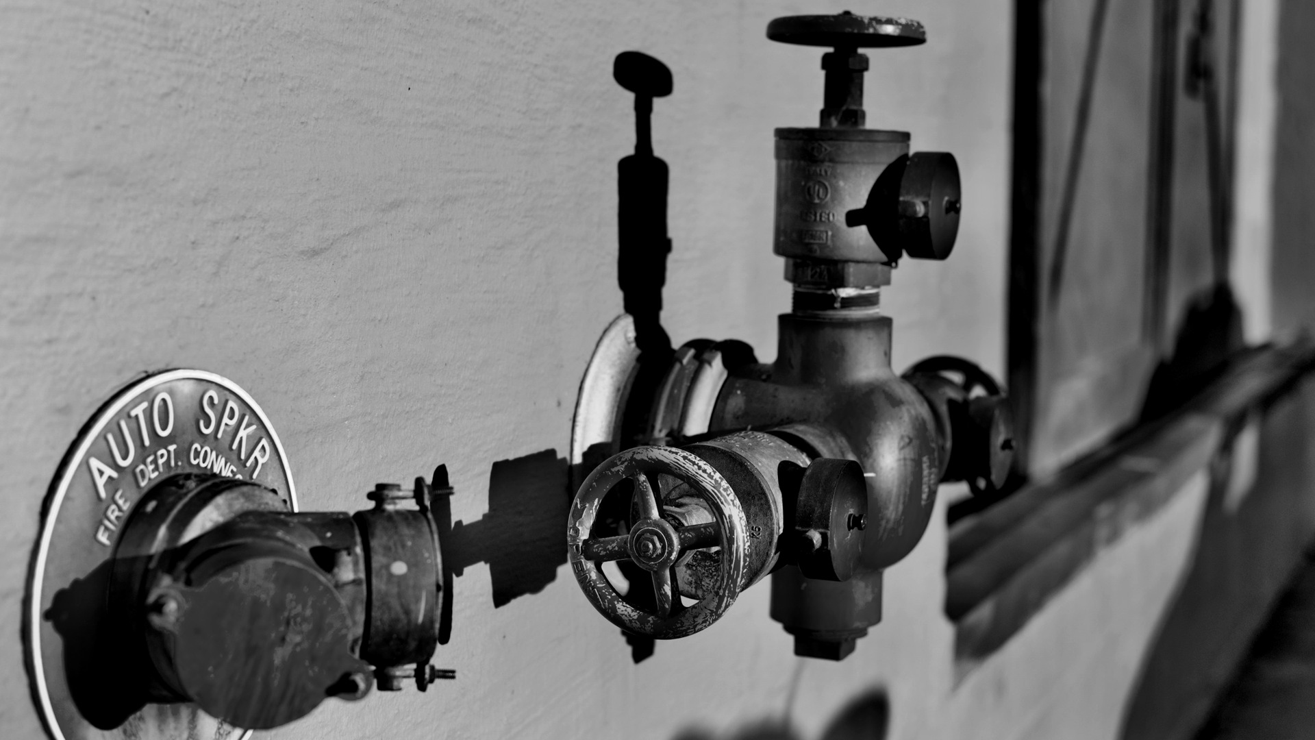 Red and gray hydrant gate valve.