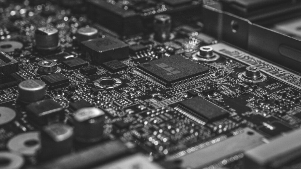 Macro photography of black circuit board.