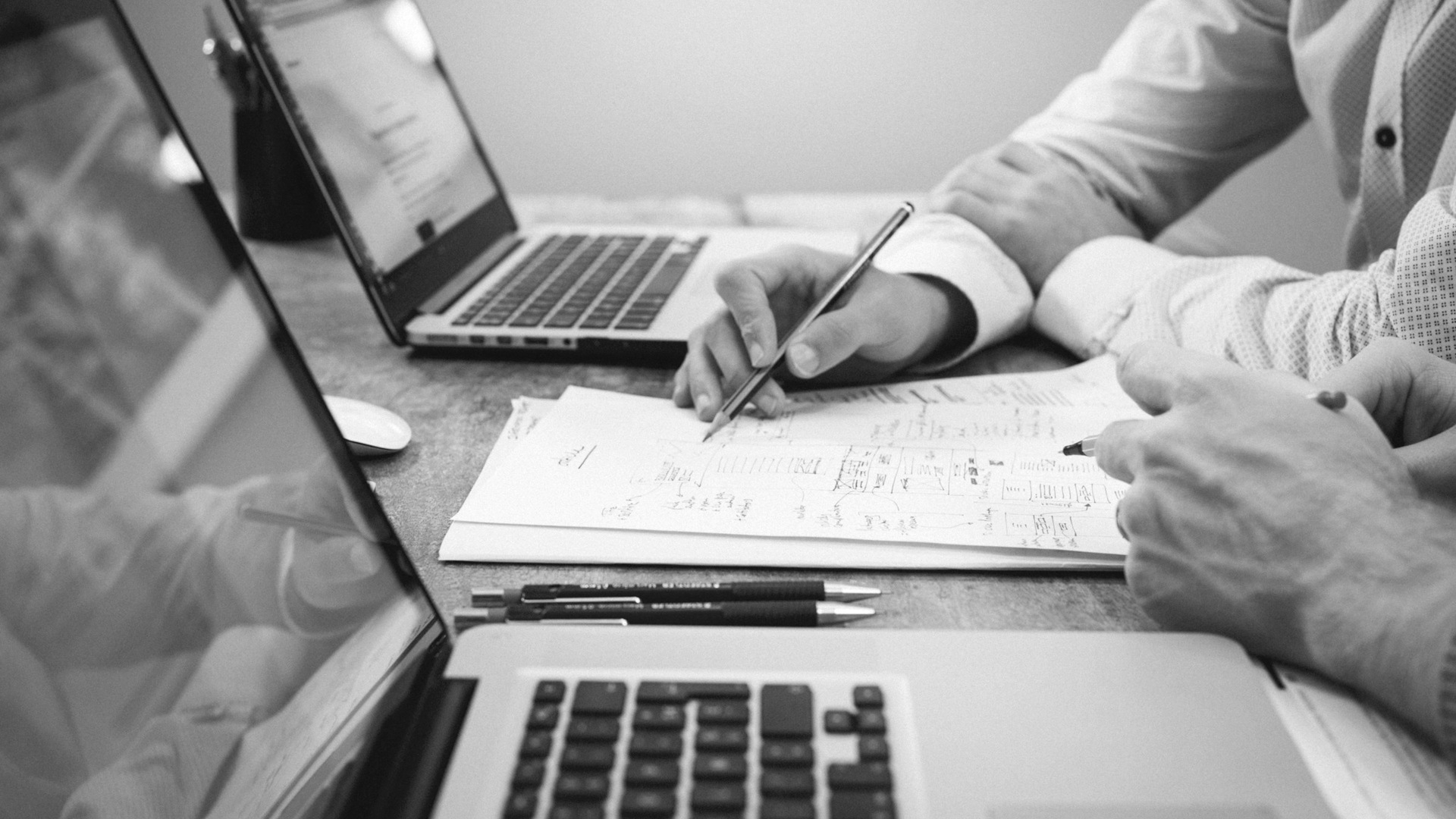 Financial Insurance marketing & GTM growth: qualified insurance quotes and adviser-led conversion 1 Person holding pencil near laptop computer.