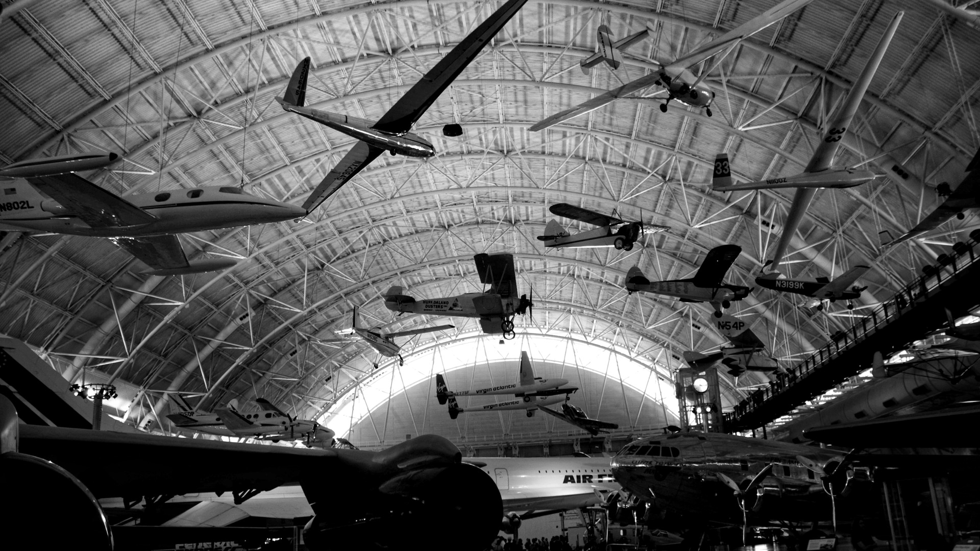 Black and white airplane in a building.